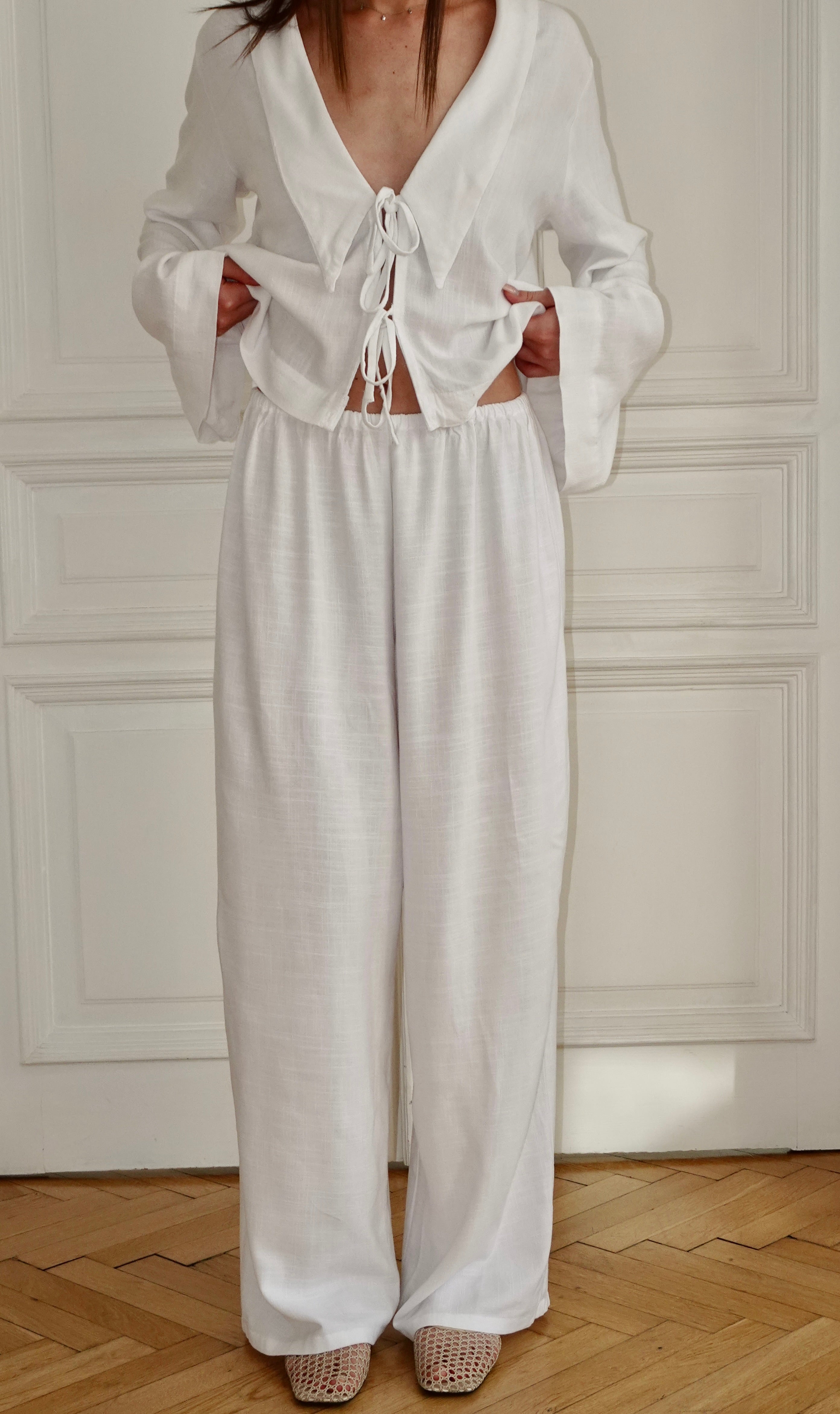 White "Meadow" trousers with pockets